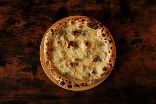 four cheese pizza gorgonzola parmesan mozzarella